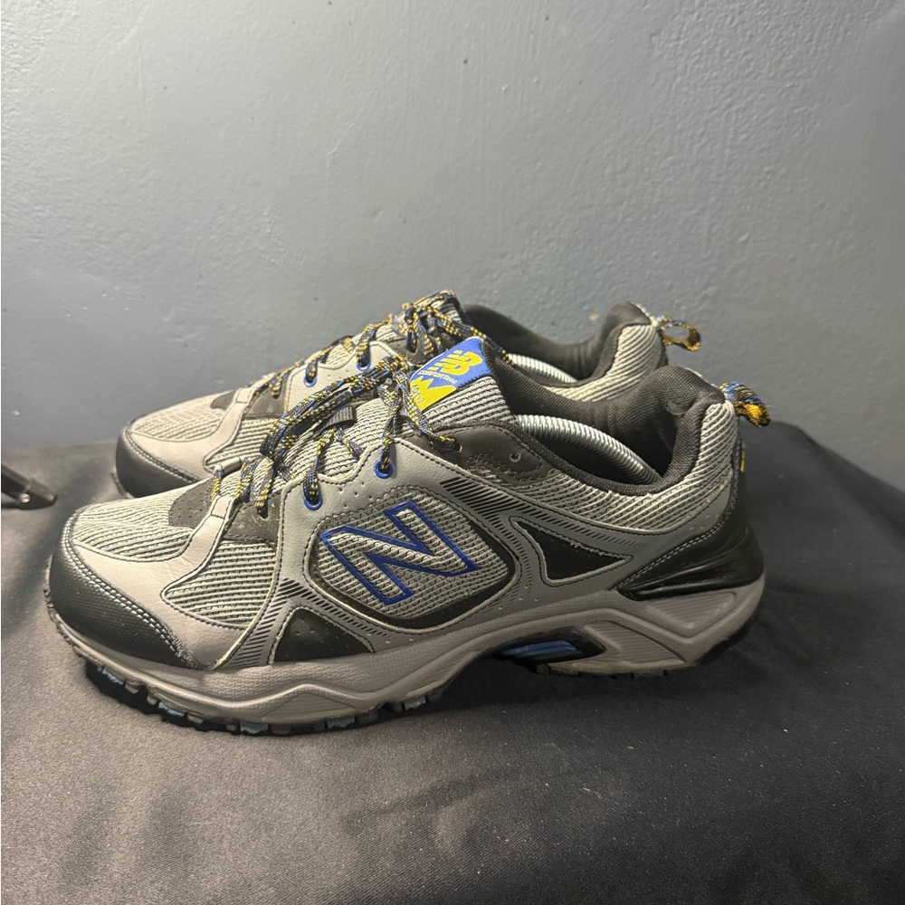 New Balance Men's Gray Athletic Sneakers with Blue & Yellow Accents